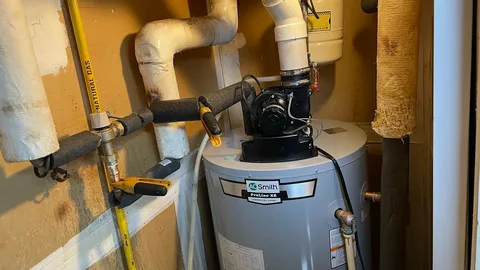 Professional water heater replacement service being performed in a residential home to improve hot water efficiency and reliability.